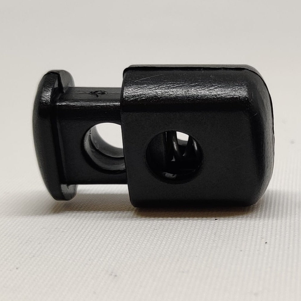 Black plastic chunky cord lock