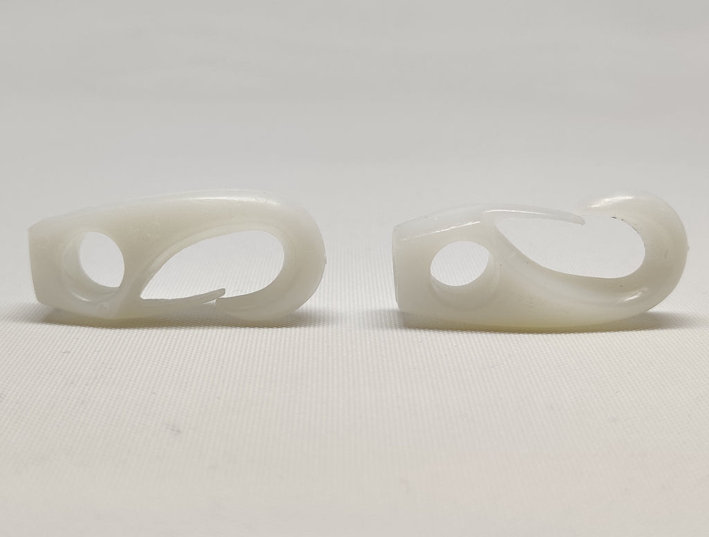 Two white plastic shockcord hooks