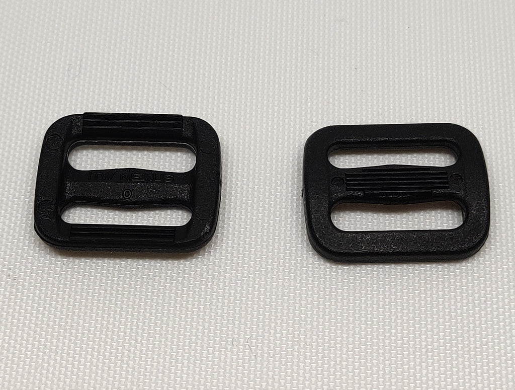 Two black triglide buckles