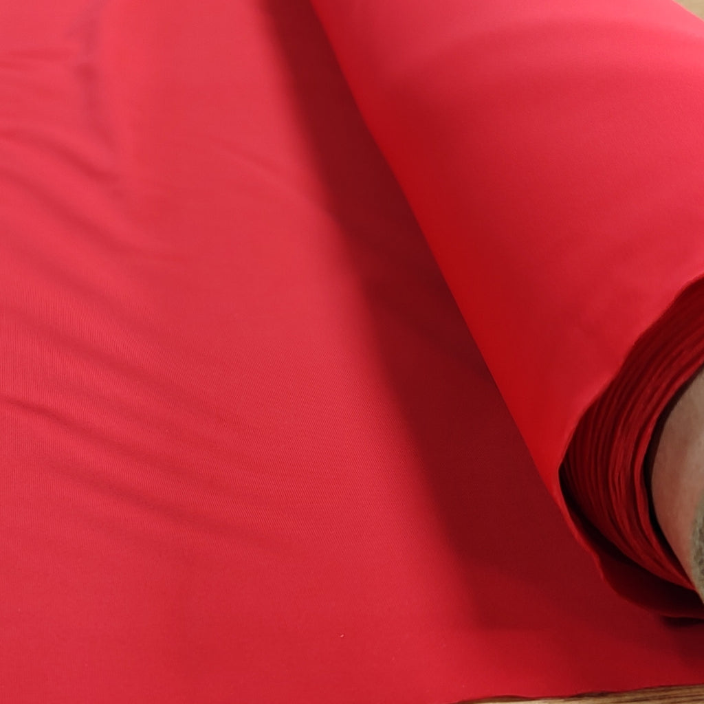 Roll of red lycra fabric