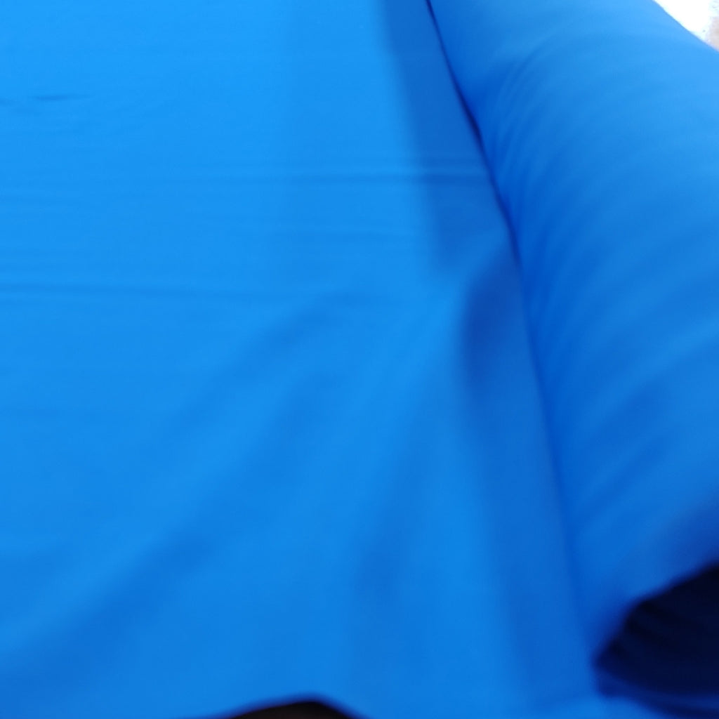 Roll of royal blue lycra fabric