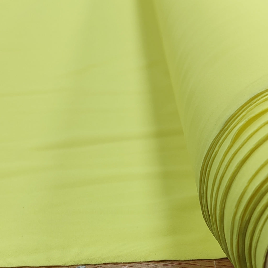 Roll of yellow lycra fabric