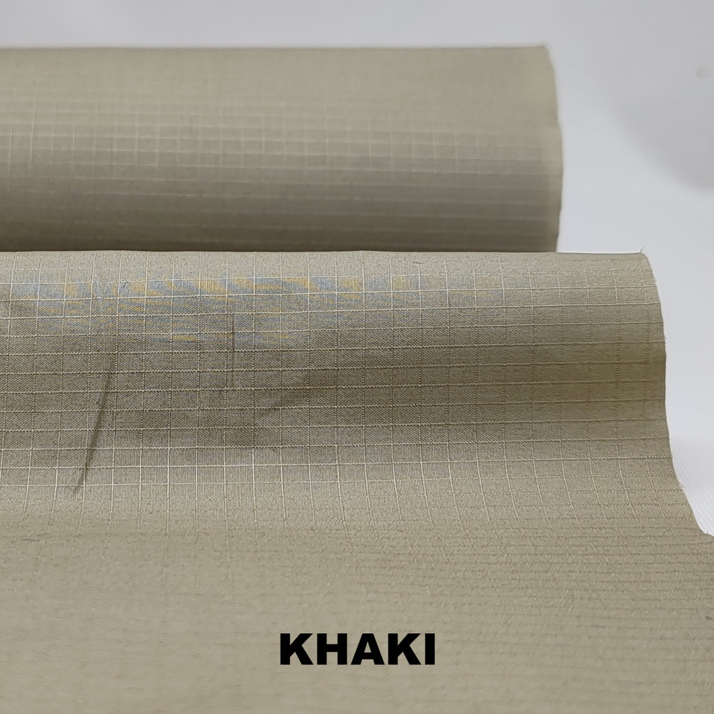Khaki dry wax cotton riptstop fabric by British Millerain
