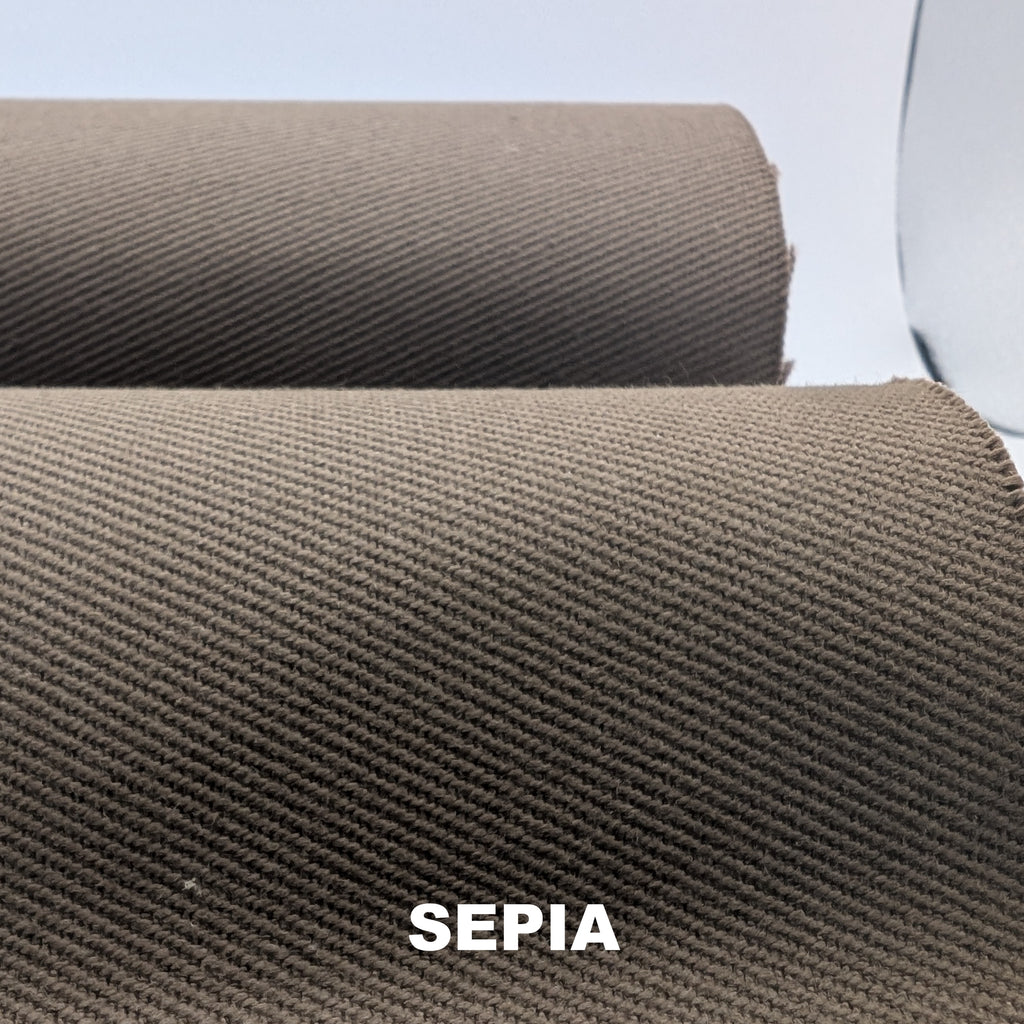 A roll of brownish tan "sepia" lickwax fabric