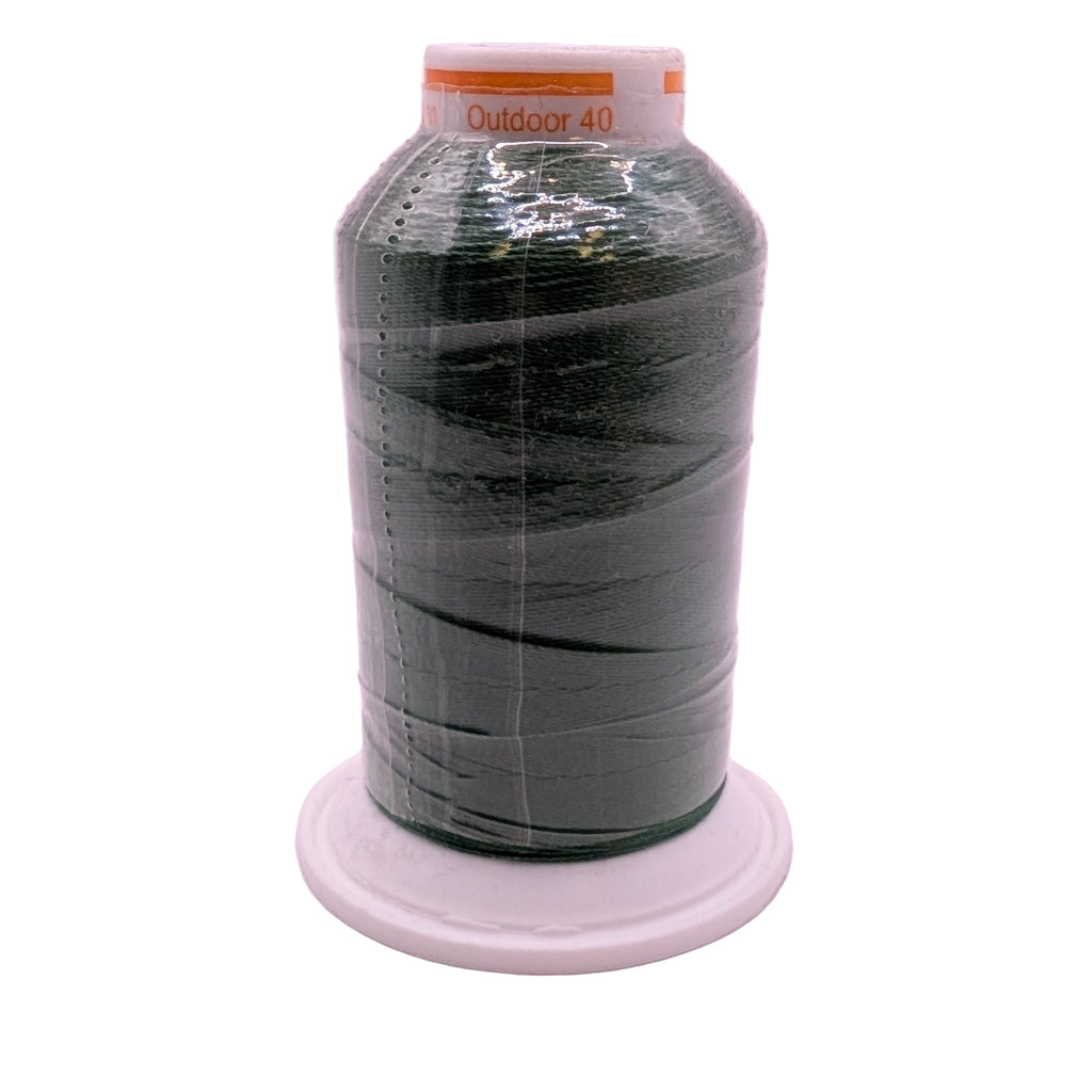 Spool of green outdoor 40 thread on a white background
