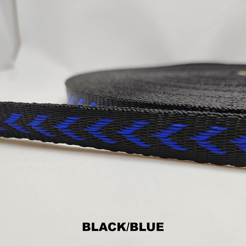 Roll of black polypropylene webbing with royal blue chevron pattern