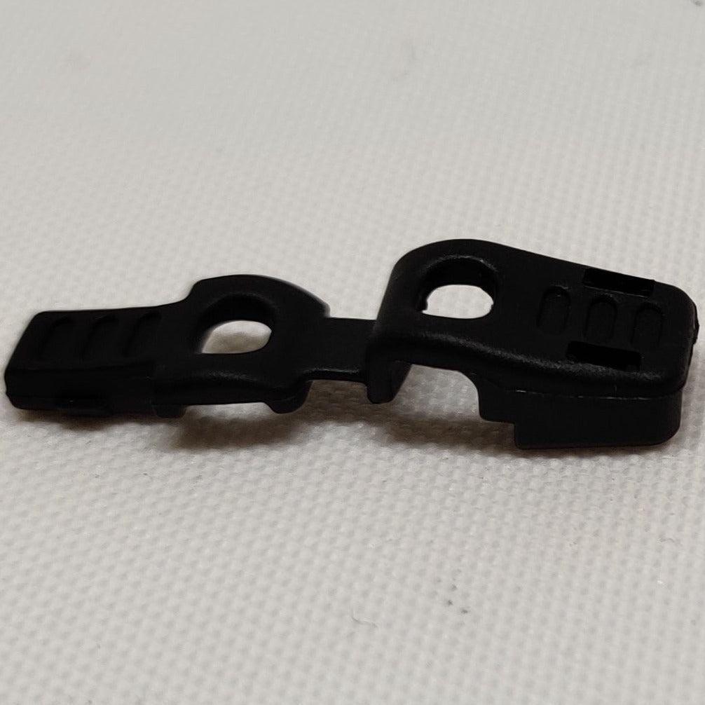Black plastic cannon clip cord end from ITW Nexus