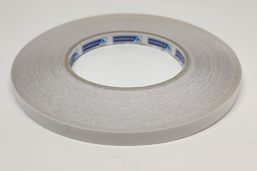 Roll of 6 millimetre wide clear double sided seaming tape