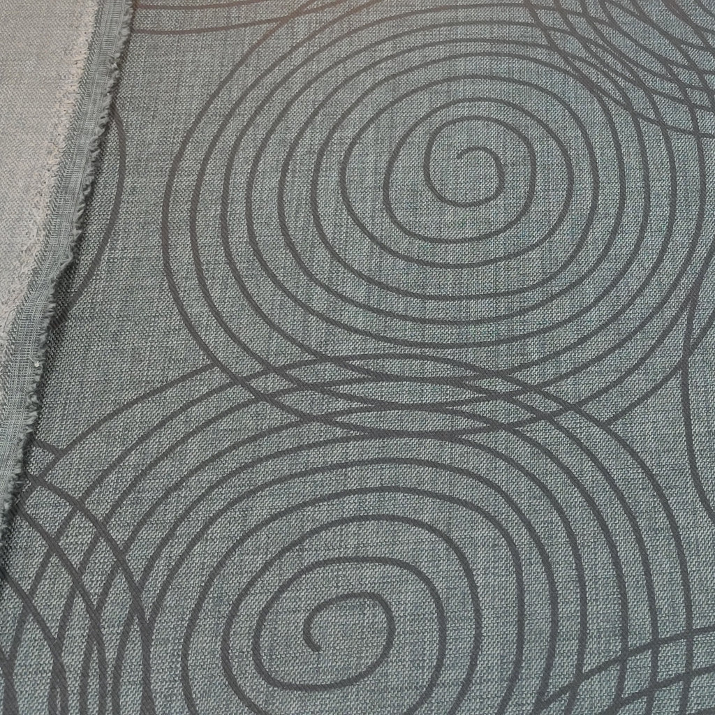 Grey acrylic fabric with large black swirl pattern and light grey underside