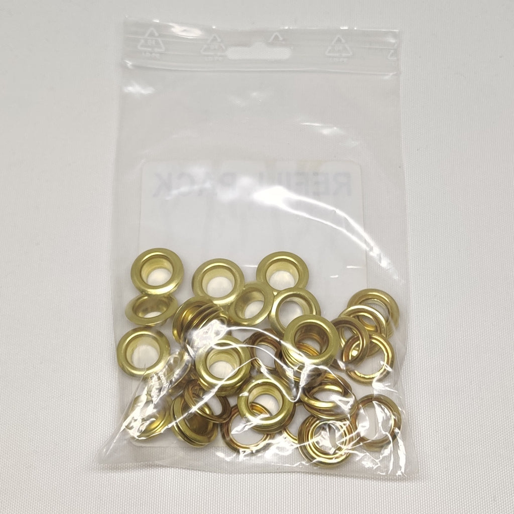 Pack of brass eyelets for refill