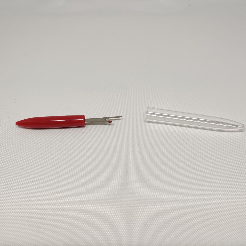 Red handled sail picker shown without lid
