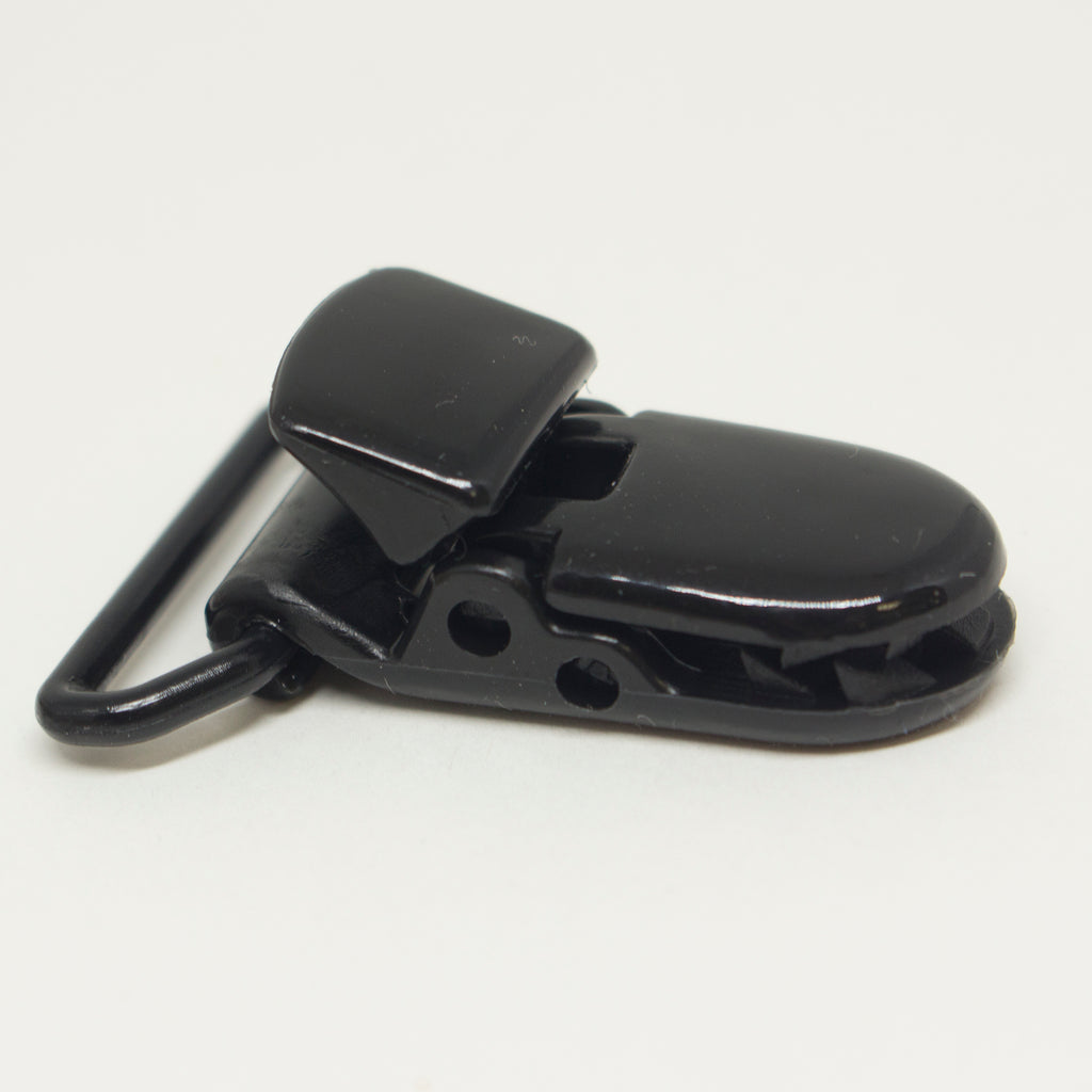 Black plastic crocodile suspender clip